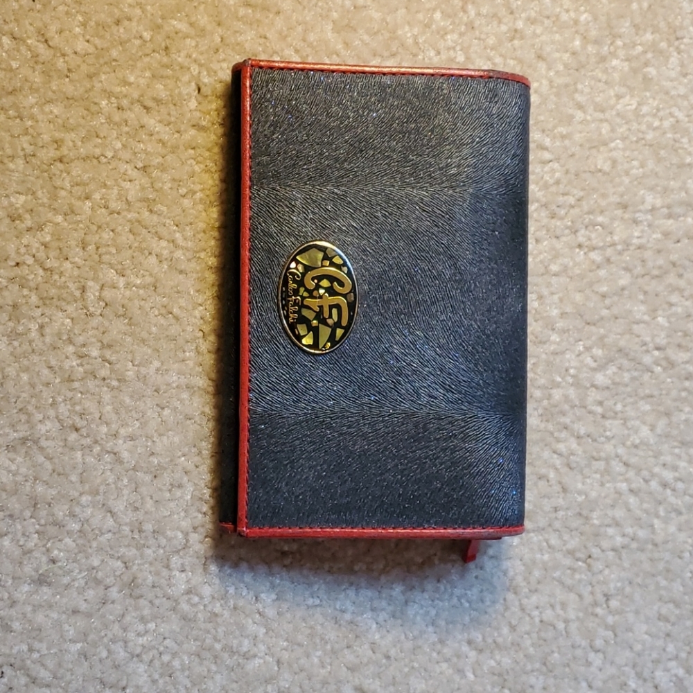 This is a Carlos Falchi wallet